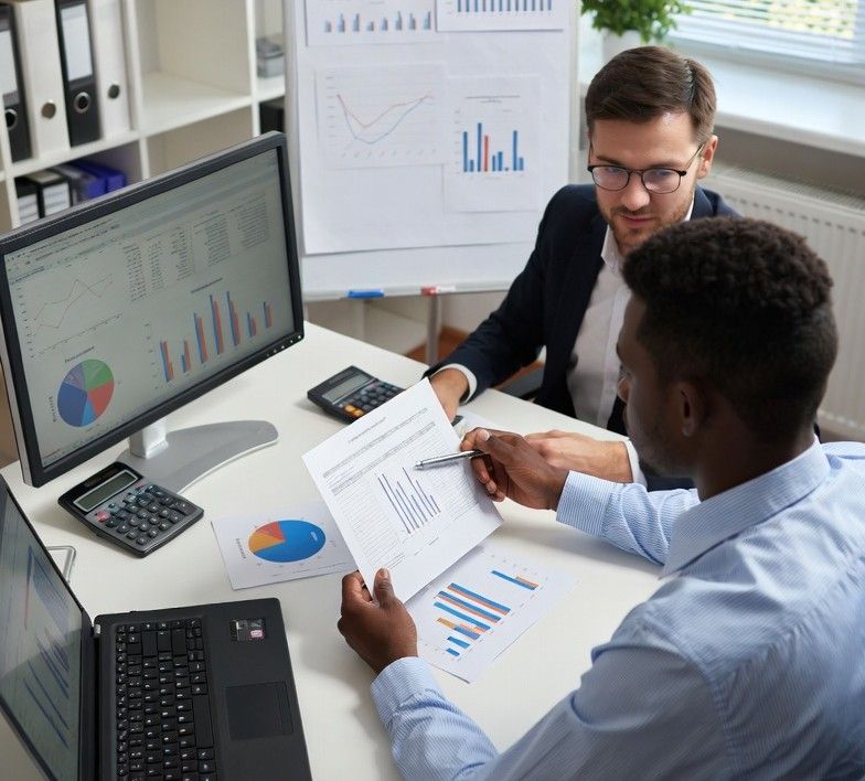 financial advisor explaining loan options with charts